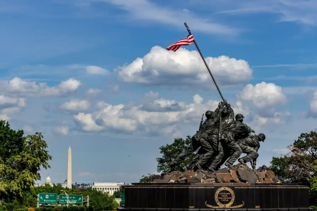 The Marine Corps War Memorial in Arlington with the Washington Monument behind it