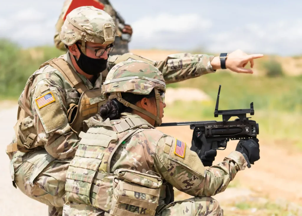 U.S. Army soldiers in helmets and body armor during combat training